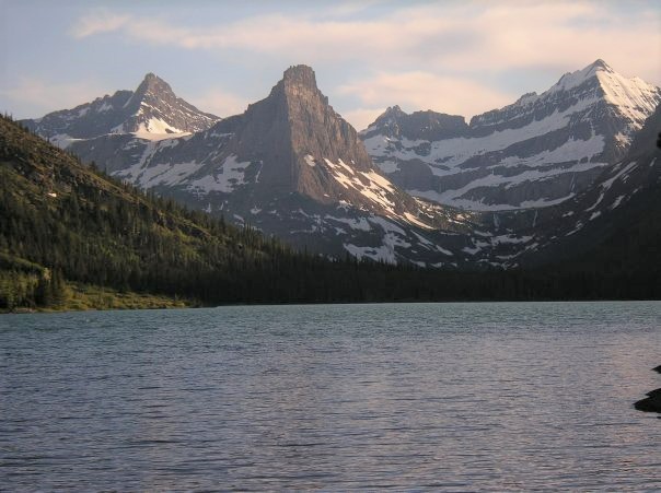Cosley Lake with jagged mountain peaks in the background, with visible glaciers.