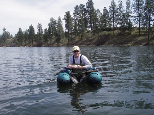 Happy fly fisherman on Amber Lake. Photo: Brad Northrup