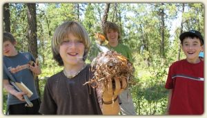 Fire and shelter building, ethics/Leave No Trace, and biking skills are just a few of the learning adventures that await your child. Photo: Twin Eagles Wilderness School