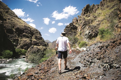 Hiking in Hells Canyon. Photo: Logan Crable, courtesy of ROW Adventures