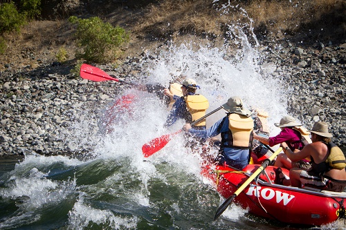 Rafters keeping warm paddling the Snake River. Photo: Jared Cruce, courtesy of ROW Adventures