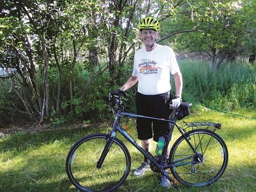 Bill Gothmann, founder of Valleyfest's Cycle Celebration, stands by his bike. Photo: Carolbelle Branch