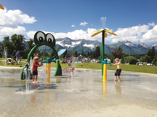 There are miles of community trails, a river running through town, the Fernie Aquatic Centre and splash park, and plenty of shady parks and fun playgrounds to visit. Photo courtesy of Tourism Fernie
