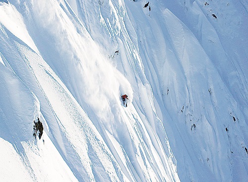 Approaching the bottom, he clears a giant crevasse with a graceful gap jump and safely slides into home plate where the film crew is waiting with rounds of high-fives and a pure Jeff Spicoli moment where a fellow TGR athlete screams out “That was SO SICK bro.” Photo courtesy of Teton Gravity Research