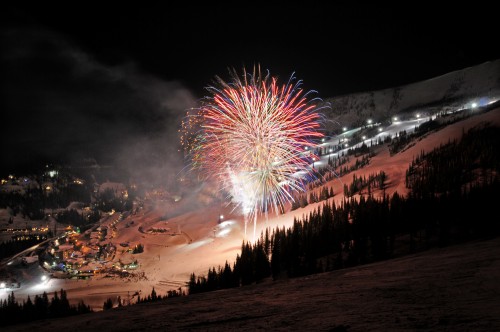 Fireworks light up the sky above the Village at Schweitzer ski mountain.