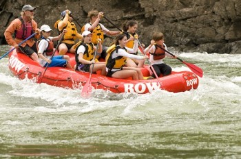 Peter Grubb guiding a boat-load of eager paddlers down the Lower Salmon River. Photo courtesy of ROW Adventures