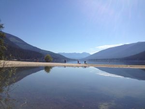 Paddlers heading out on Kootenay Lake near Nelson. Photo: Derrick Knowles