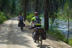 John and Geoff riding to Warm Lake on the first day. // Photo: Hank Greer