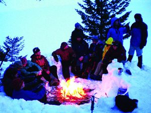 Building a snow cave the right way is a lot easier (and more fun) with a few helping hands. Be safe. Have fun. And stay warm! // Photo: Holly Weiler