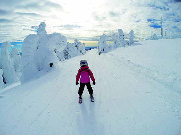 Young skier on cat-track trail on the southwest side of Mt. Spokane Ski & Snowboard Park. Photo by Judd McCaffree.