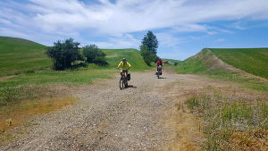 Photo of two bikers on John Wayne Pioneer Trail by Robert Yates