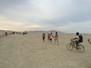 Photo of runners at Burning Man by Janelle McCabe.