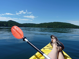 Photo of paddler on Lake CdA by Amy S. McCaffree.