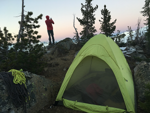 Photo of tent in alpine setting by Summer Hess.