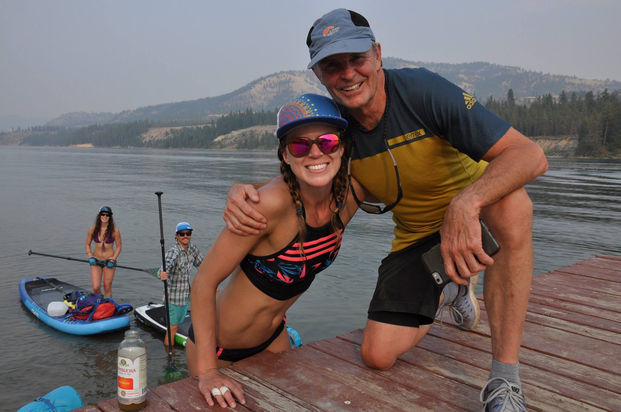 Allie and her father-in-law, John Roskelley, a few hundred yards from the team's final destination at the confluence of the Columbia River and Lake Roosevelt. John and his wife, Joyce, met the team at various stopping points along their route to drop snacks and kombucha. (Photo from Allie Roskelley.)