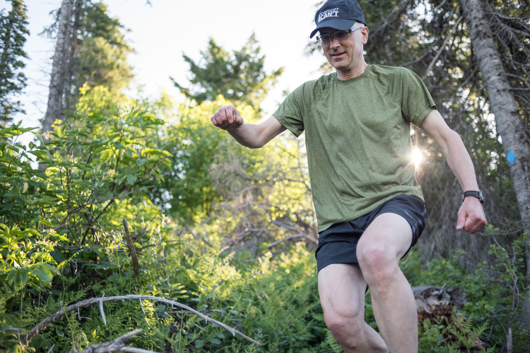 Thiessen running with "Cancer Can't" hat (Photo: Craig Goodwin)