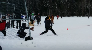 Photo of snowshoe softball tournament courtesy of Dan Barrington.