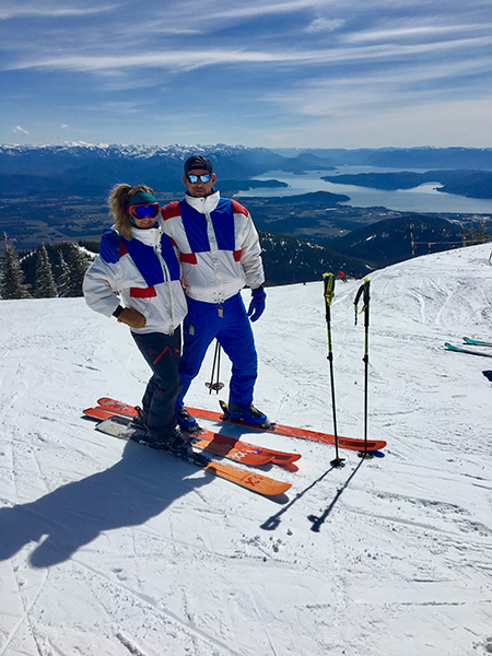 Photo of couple skiing in 90s apparel.