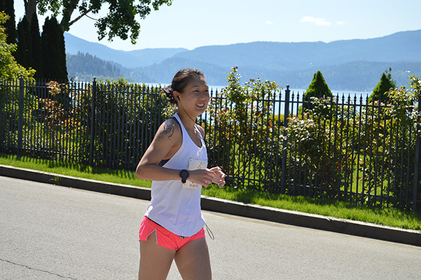 Photo of runner along the CdA lakefront.