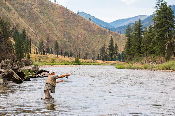 Photo of fly fisher in the Salmon River.