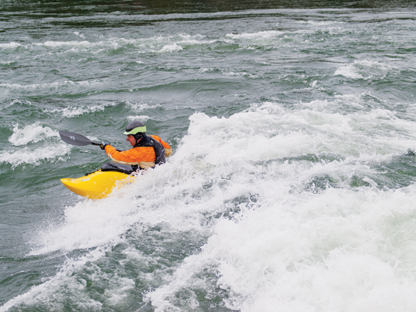 Photo of kayak surfer.