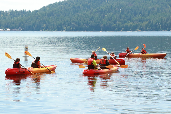 Photo of kids kayaking.