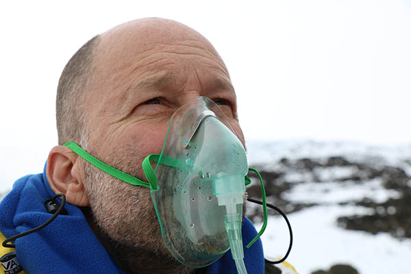 Photo of climber using oxygen.