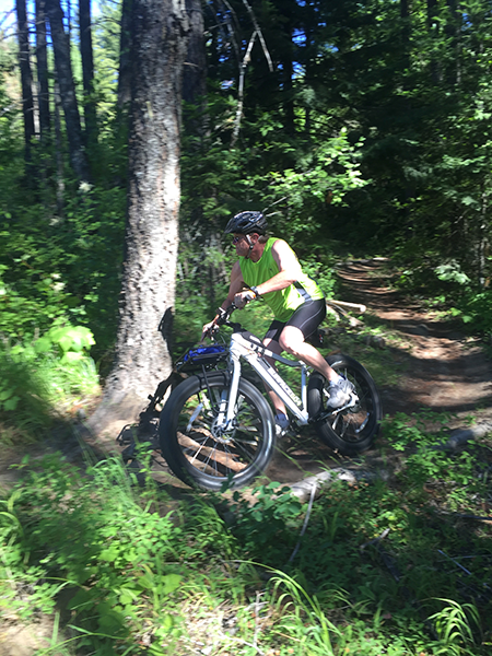 Photo of e-bike on mountain bike trail.