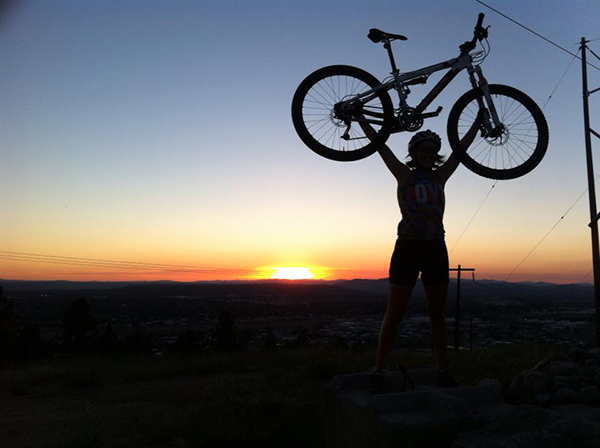 Silhouette of biker at sunset