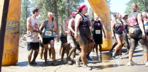 Photos of racers at the finish line of the Dirty Dash.