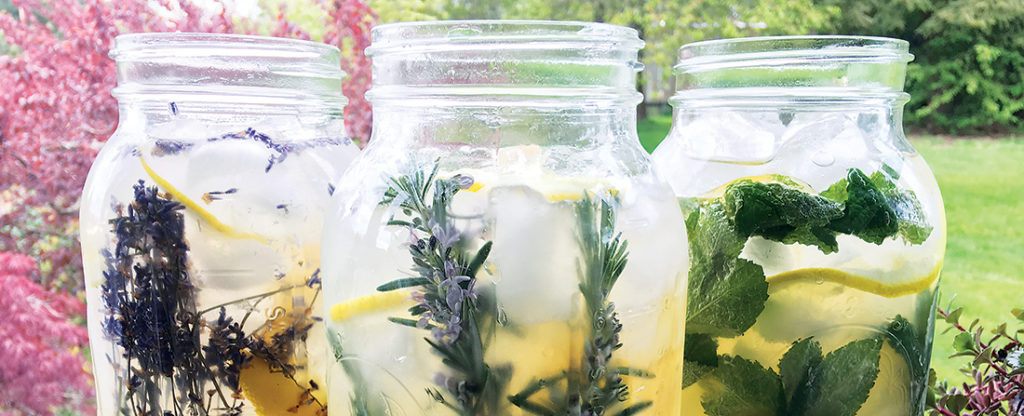 Herbal lemonade in mason jars.