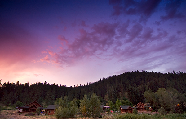 Photo of sunset over River Dance Lodge.