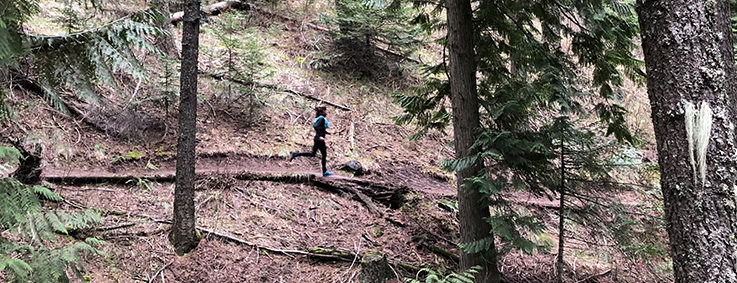 Lisa Laughlin running on the Headwaters Trail on Moscow Mountain.