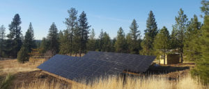 Photo of solar panels installed on the ground.