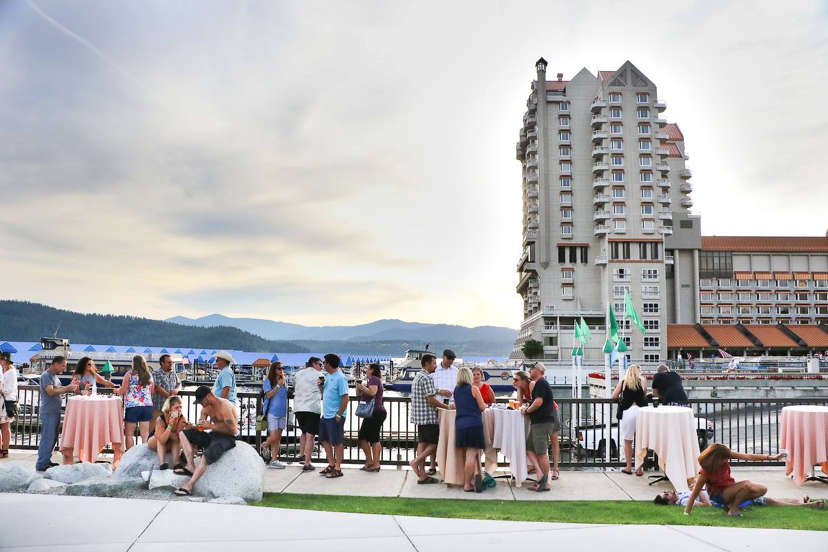 Groups drinking beer near the lake