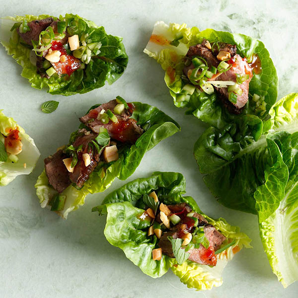 Photo of lettuce cups with steak and vegetables.