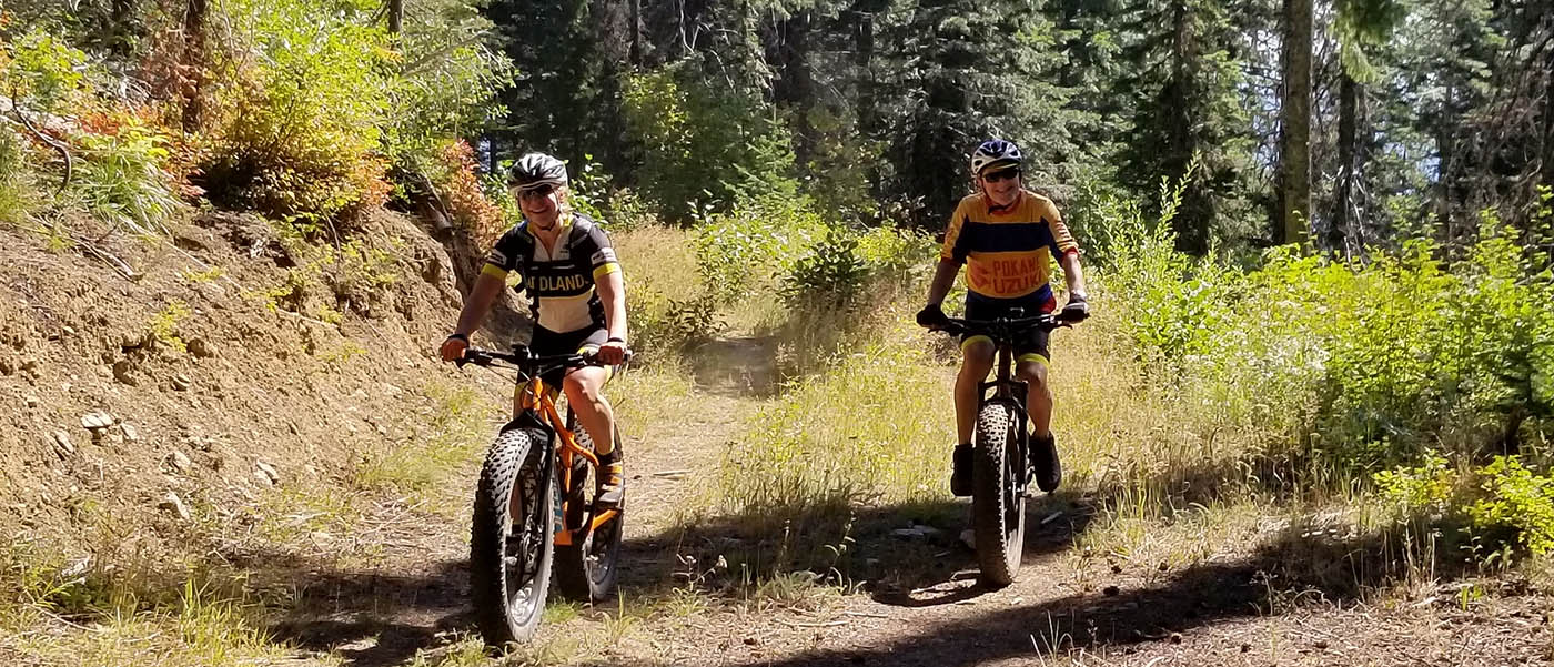 Lisa_Marie Perino and Alex Renner ride fat bikes on Mt. Spokane.