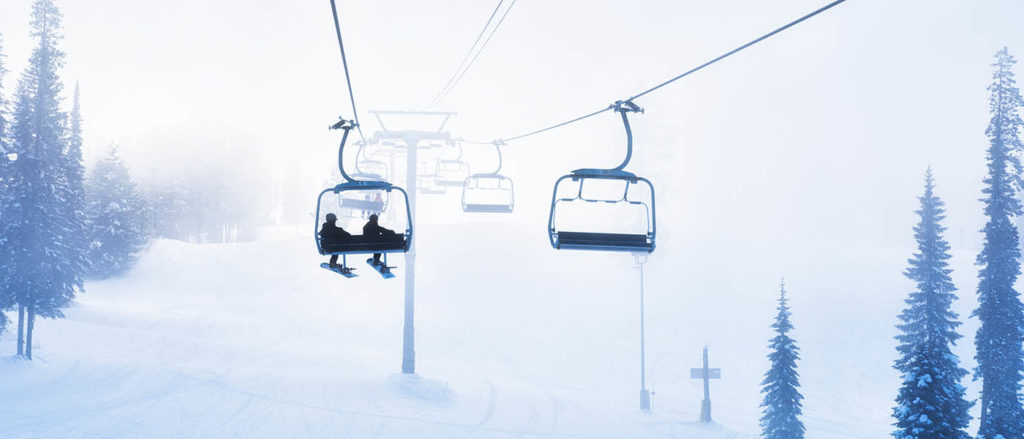 Photo of skiers on chairlift at Kimberly Resort.