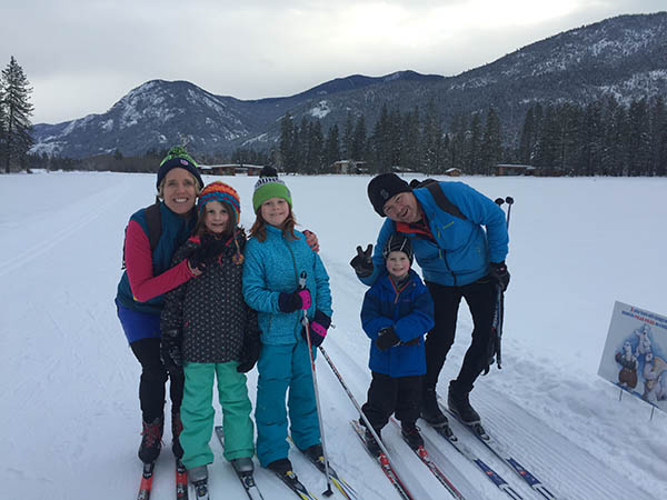 Photo of the Ritchie family posed with cross-country skis.