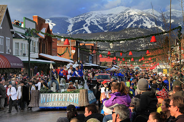 Photo of parade down Whitefish's main street.