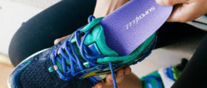 Close up photo of running shoe with Superfeet insoles.