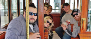 Photo of pub crawlers on trolly.