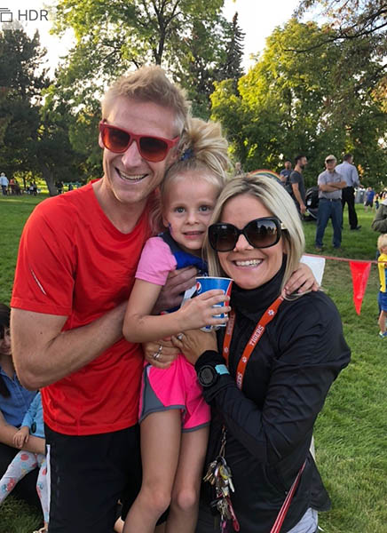 Portrait of LeFriec family in running attire.