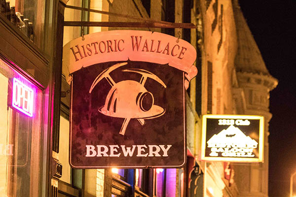 Photo of Wallace Brewery sign at night.