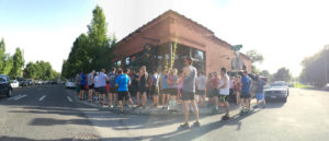Photo of the Lantern Run Club gathered outside of Manito Tap House.