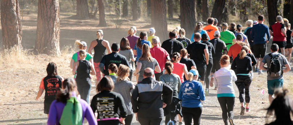 Photo of runners from behind.