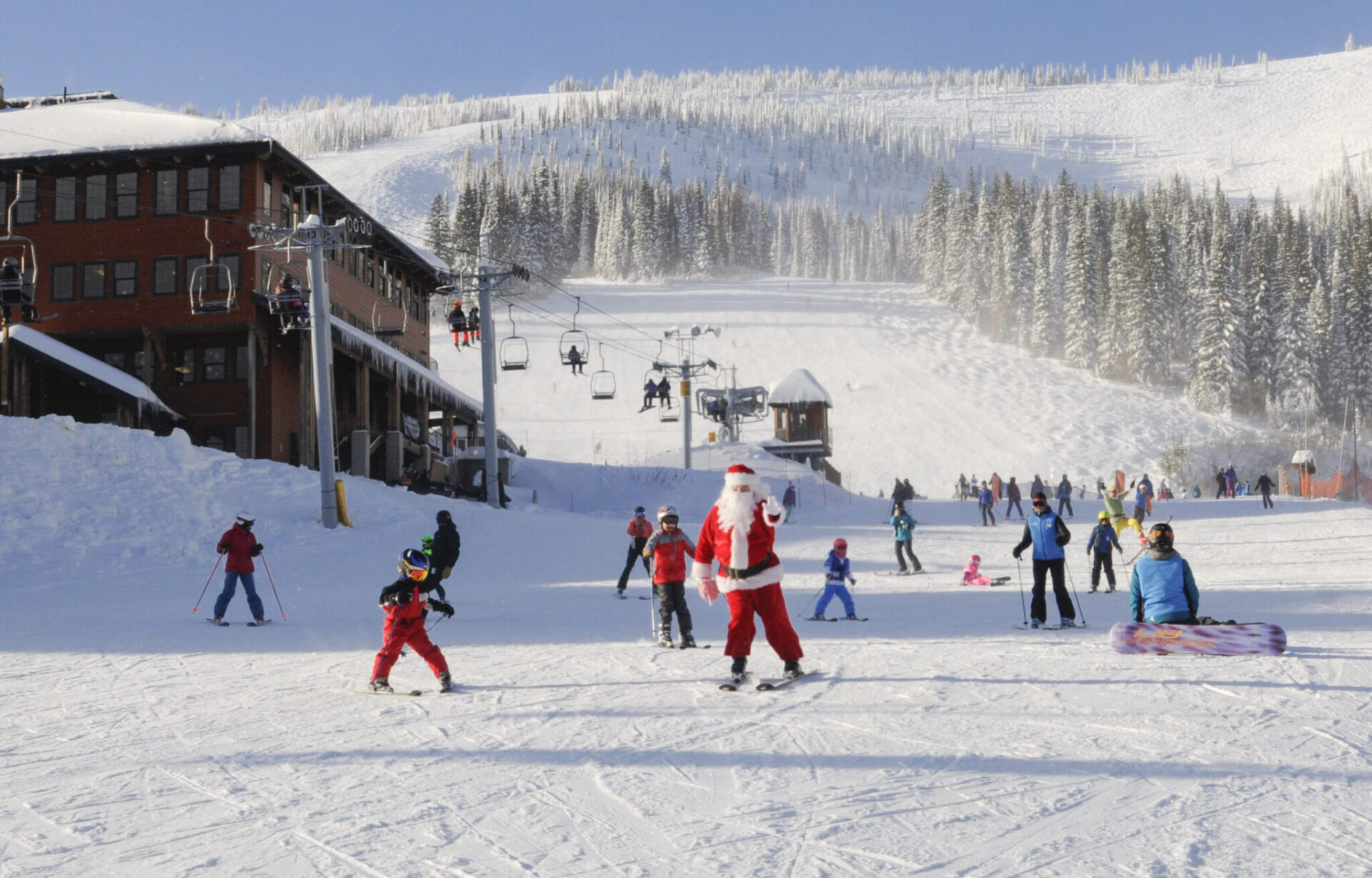 Ski-with-Santa-on-the-bunny-hill-at-Schweitzer-Mountain-photo-courtesy-Schweitzer-Mountain-Resort-scaled-scaled.jpg