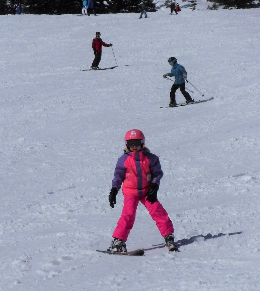 Young skiers going down Midway run at Schweitzer.