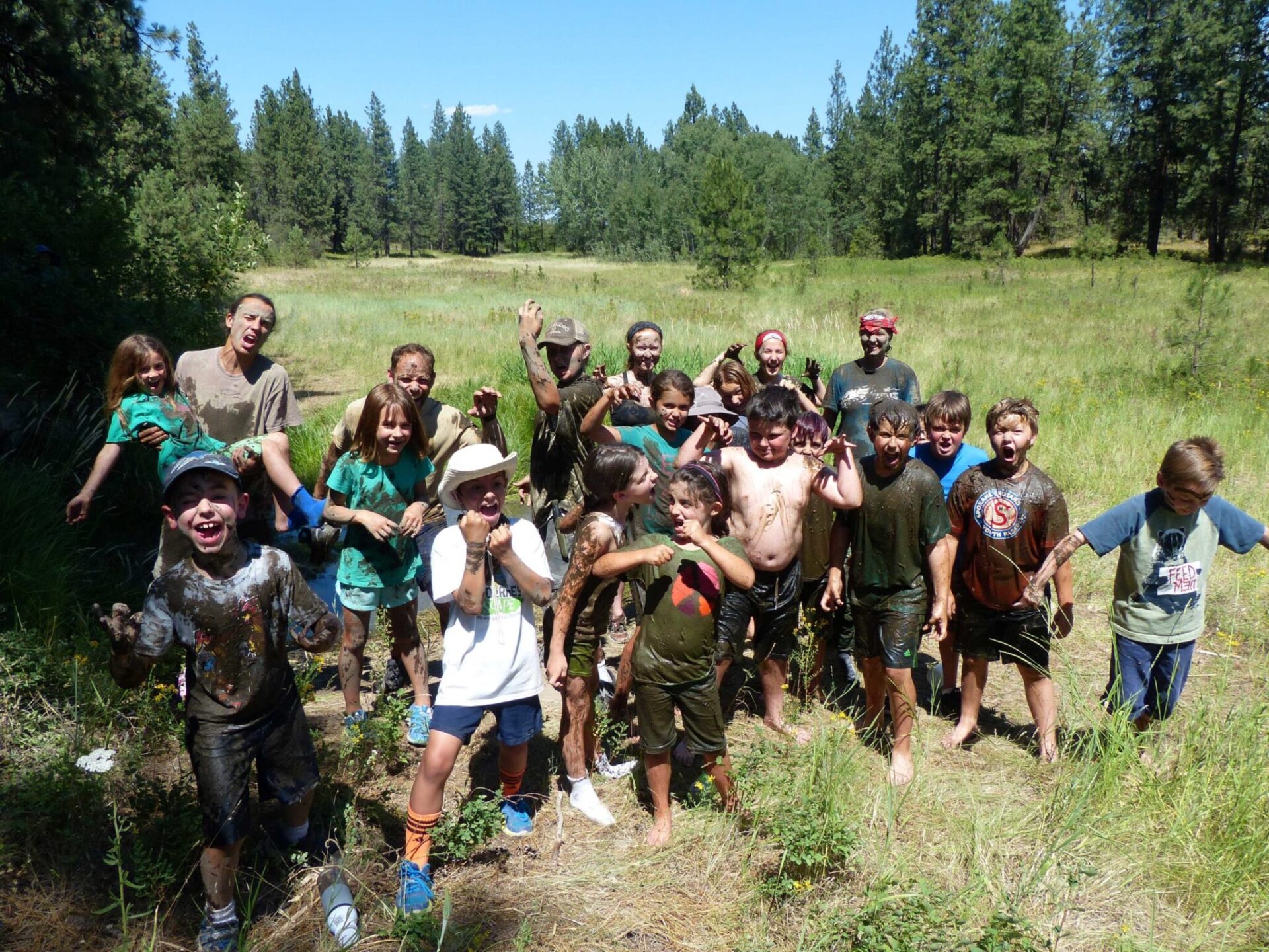 A group of muddy kids.