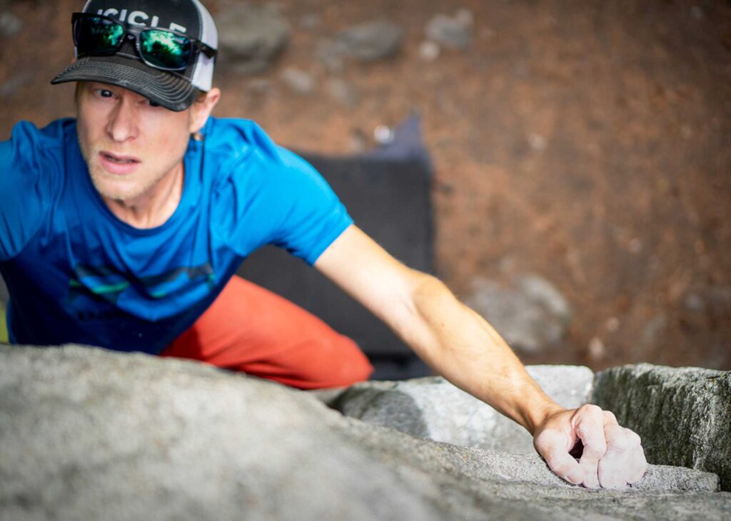 A man rock-climbing.